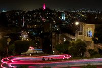 View of Coit Tower and Lombard Street in San Francisco, California at night